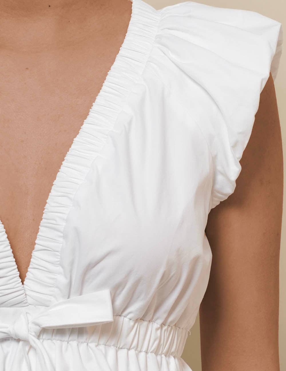 Ladies V-neck Waist Bowtie Sleeveless White Top SKT51005