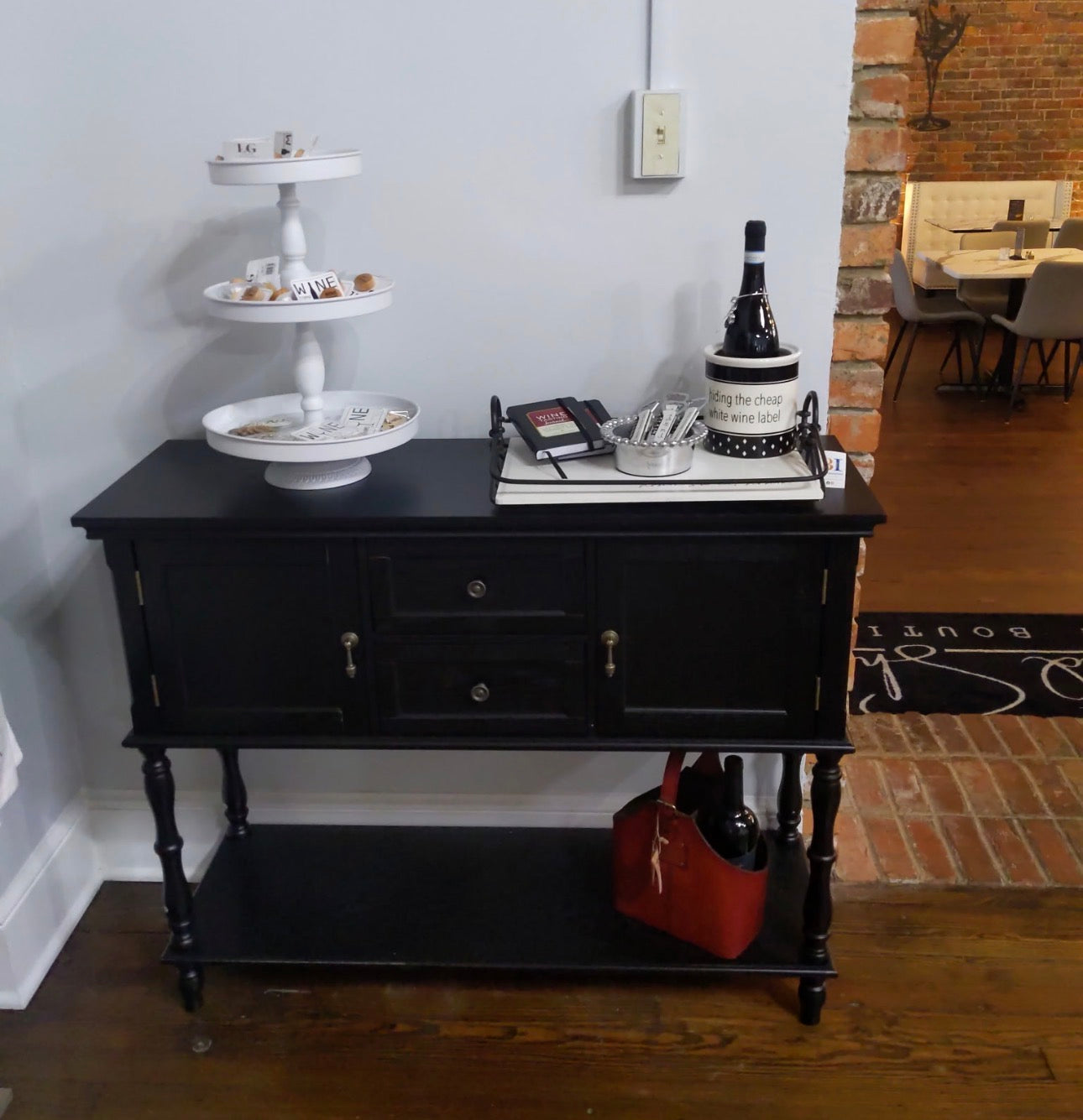 Black side table with cabinets and drawers