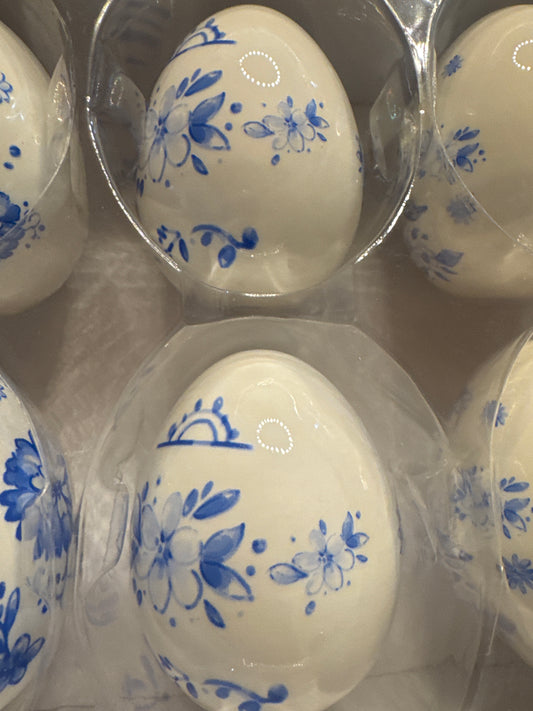 White with blue egg