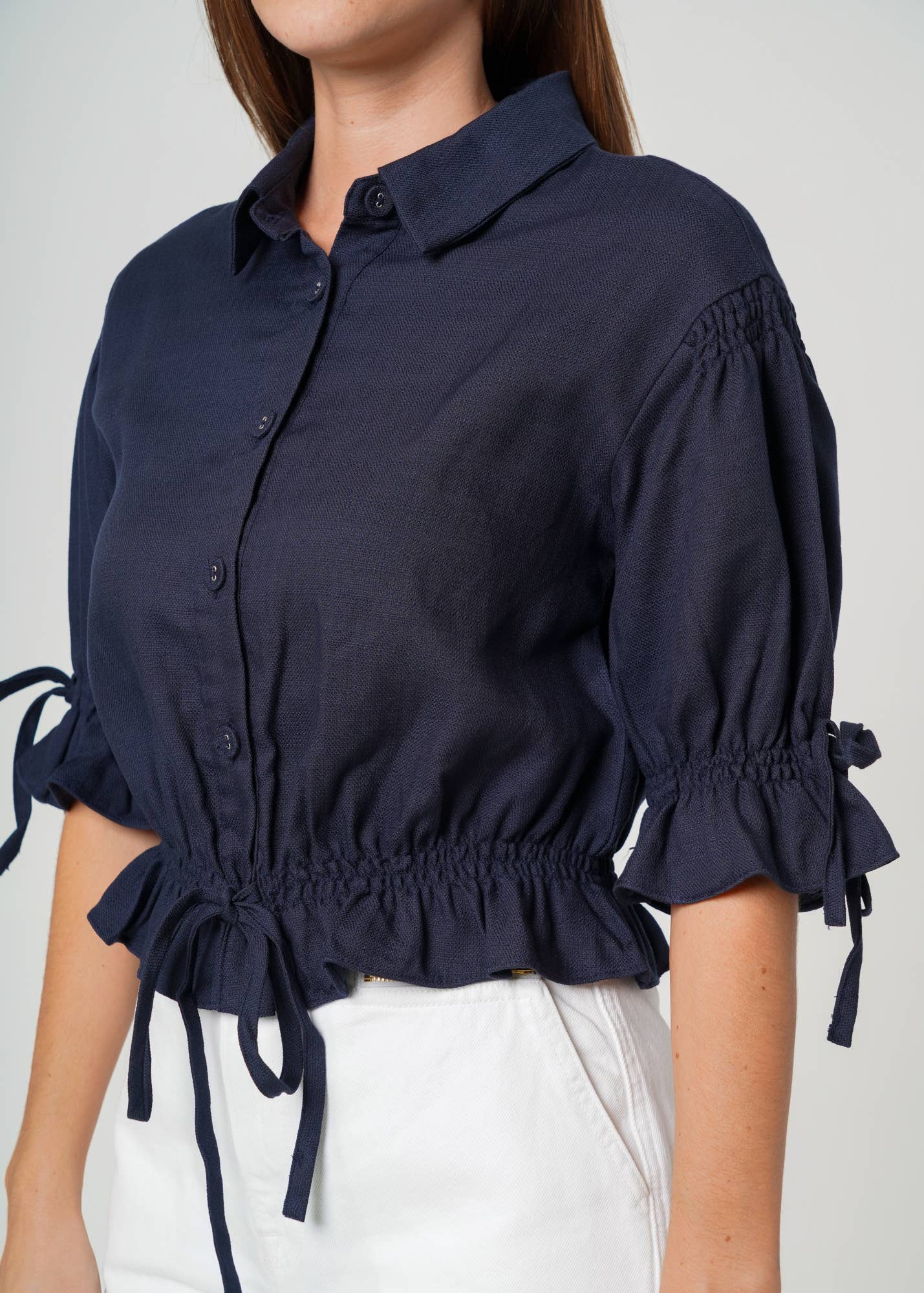 Nurode's Button Front Tie Hem Blouse in Navy
