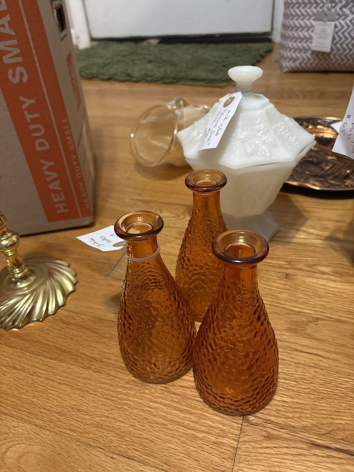 Three amber bottles